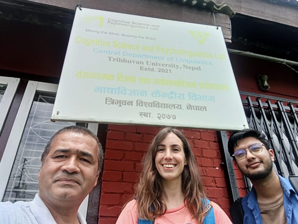 Dr. Lekhnath Sharma Pathak, Prof. Arrate Isasi-Isasmendi, and Sambit Rimal outside the Cognitive Science and Psycholinguistics Lab